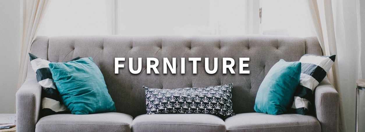 Furniture text with grey couch background